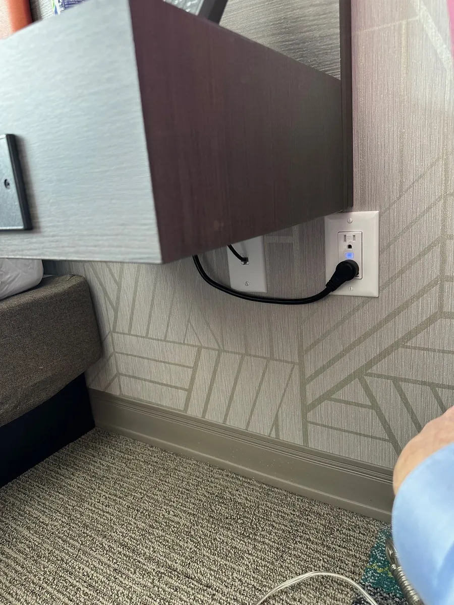 Installed smart outlet in a guest room